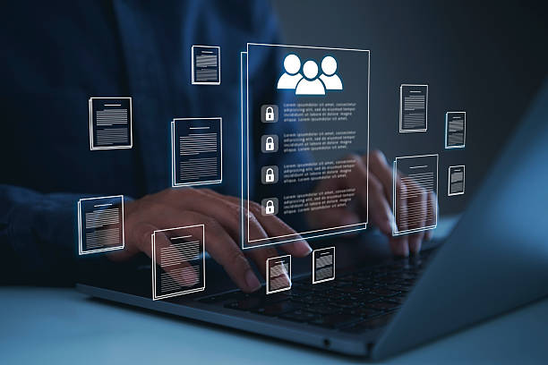 e6 Human resources data management system businessman using laptop virtual employee profile interface to organize corporate documents secure records access control and digital workforce administration.